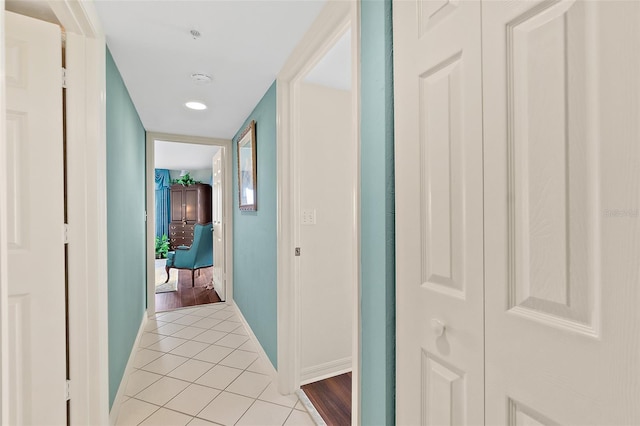 2967 S Atlantic Ave Unit 202, Daytona Beach Shores, FL 32118 - hall featuring light tile patterned floors and baseboards