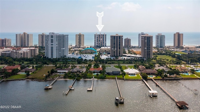 view of urban area with a nearby body of water