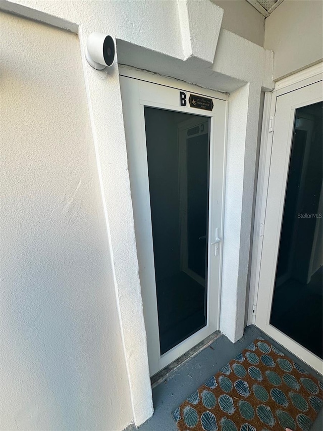 3112 S Atlantic Ave, Daytona Beach, FL 32118 - view of exterior entry with stucco siding