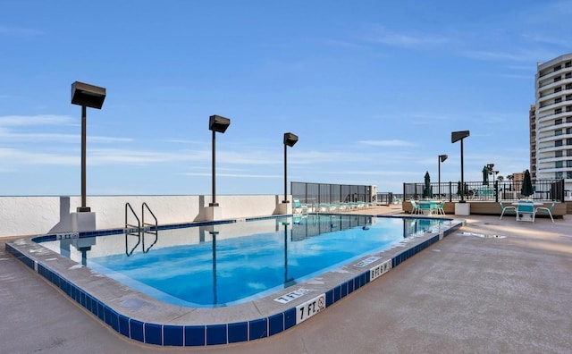community pool with fence