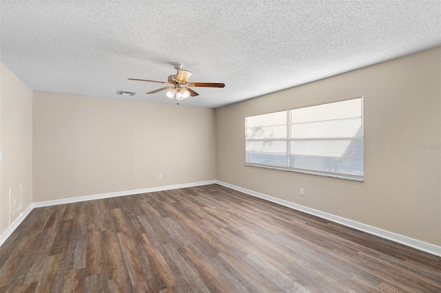 541 Northwestern Ave, Altamonte Springs, FL 32714 - spare room with ceiling fan, dark wood-type flooring, baseboards, and a textured ceiling