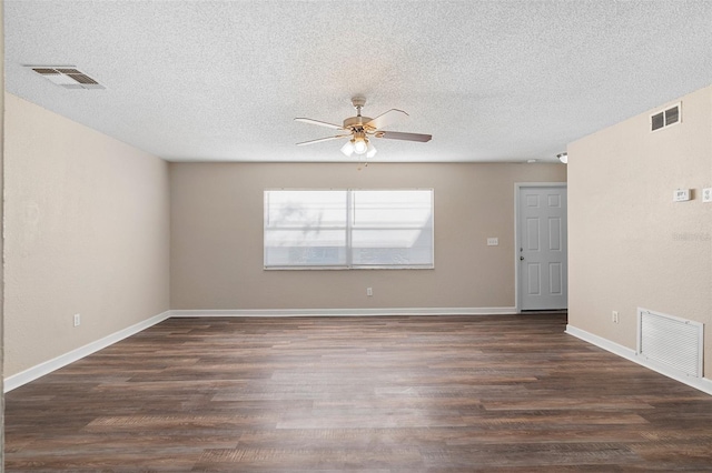 541 Northwestern Ave, Altamonte Springs, FL 32714 - unfurnished room featuring ceiling fan, dark wood finished floors, a textured ceiling, and baseboards