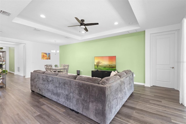 518 Briarbrook Way, Deland, FL 32724 - living room featuring a raised ceiling, dark wood-style flooring, recessed lighting, baseboards, and a ceiling fan