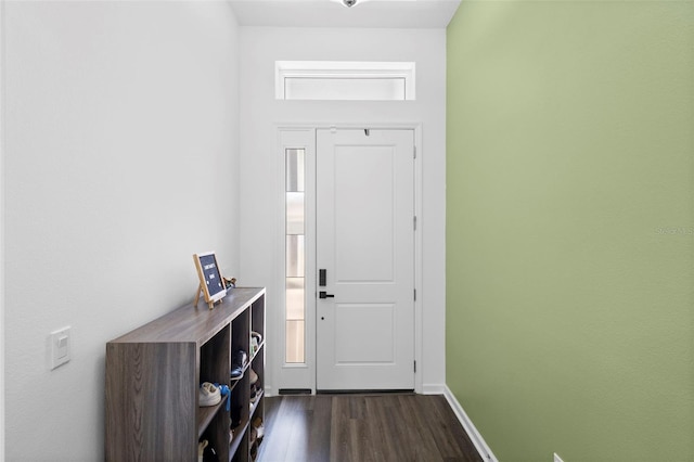 518 Briarbrook Way, Deland, FL 32724 - doorway to outside with dark wood-style floors and baseboards