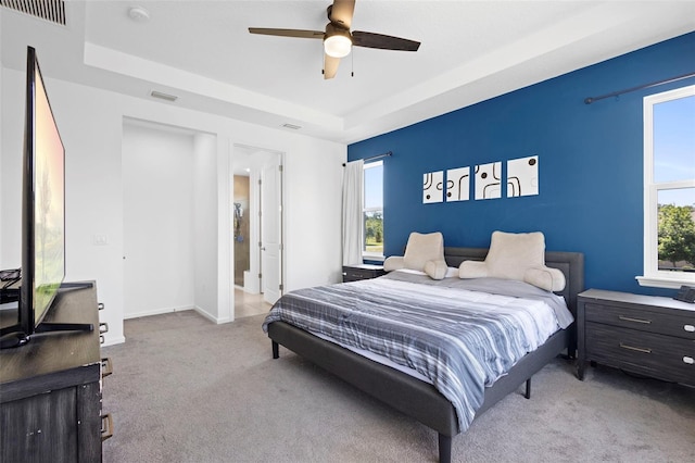 518 Briarbrook Way, Deland, FL 32724 - bedroom with carpet floors, a raised ceiling, baseboards, and a ceiling fan