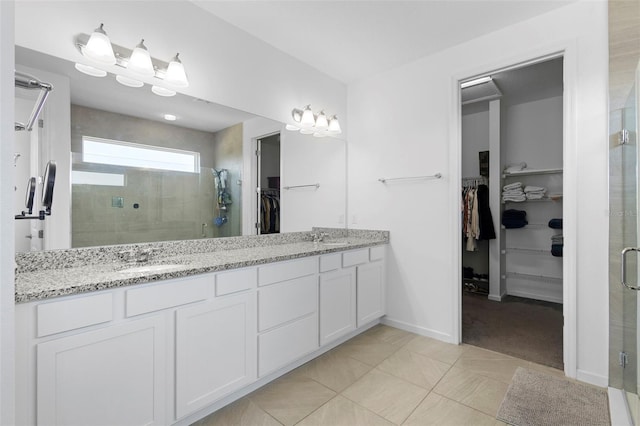 518 Briarbrook Way, Deland, FL 32724 - full bath with a stall shower, a walk in closet, double vanity, tile patterned flooring, and baseboards
