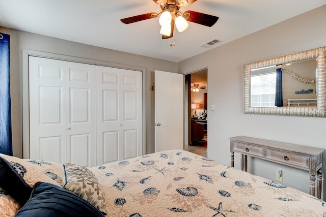 26 Ocean Shore Dr, Ormond Beach, FL 32176 - bedroom featuring a closet and a ceiling fan