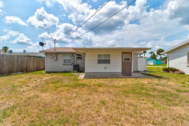 26 Ocean Shore Dr, Ormond Beach, FL 32176 - rear view of property featuring central air condition unit