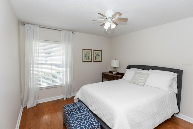 1412 Bent Oaks Blvd, Deland, FL 32724 - bedroom with wood finished floors and a ceiling fan