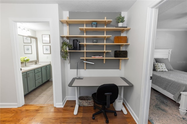 1412 Bent Oaks Blvd, Deland, FL 32724 - office area with light wood-style floors and baseboards