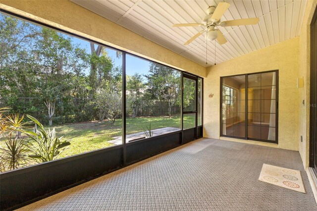 1120 W Glen Falls Rd, Deland, FL 32720 - unfurnished sunroom with a ceiling fan and vaulted ceiling