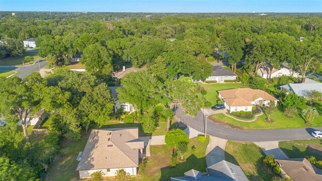 1120 W Glen Falls Rd, Deland, FL 32720 - aerial overview of property's location featuring a forest and nearby suburban area