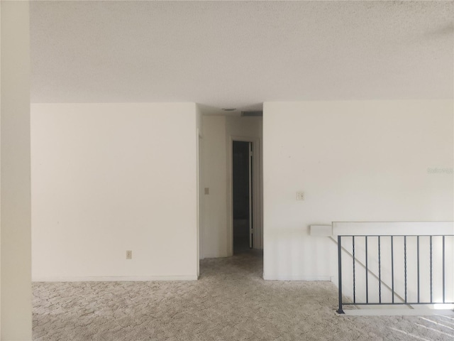 8 Oxford Ln, Palm Coast, FL 32137 - carpeted empty room featuring baseboards
