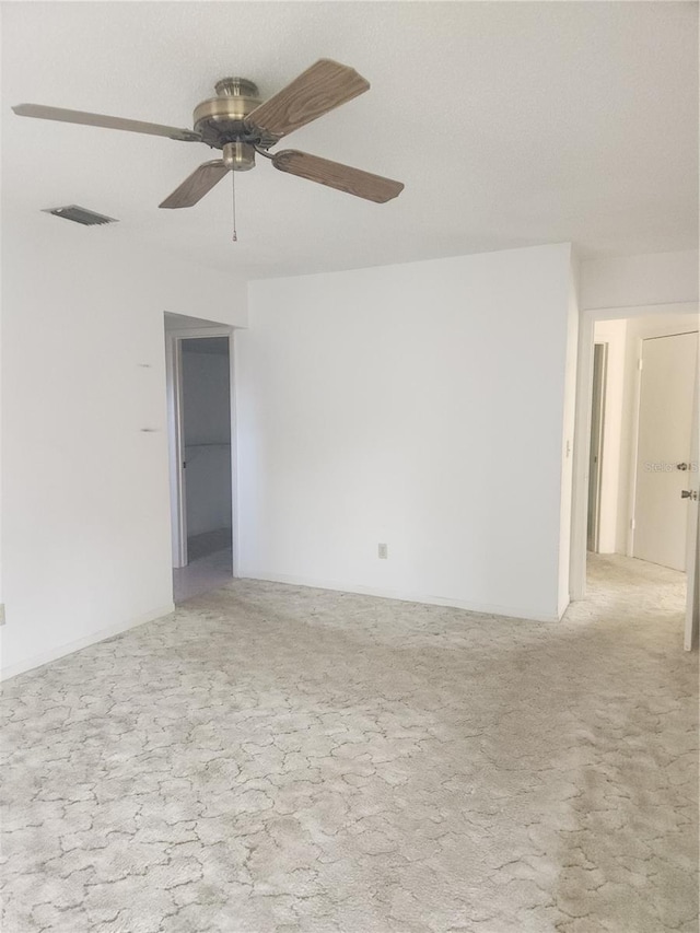 8 Oxford Ln, Palm Coast, FL 32137 - carpeted spare room with a ceiling fan