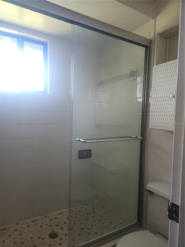 8 Oxford Ln, Palm Coast, FL 32137 - bathroom with a shower stall and toilet
