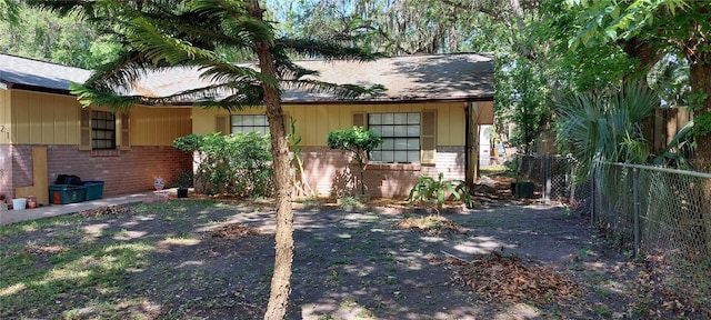 1621 Anniston Ave, Daytona Beach, FL 32117 - view of front of home with brick siding and fence