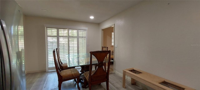 1621 Anniston Ave, Daytona Beach, FL 32117 - dining area with light wood-style floors, baseboards, and recessed lighting