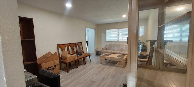 1621 Anniston Ave, Daytona Beach, FL 32117 - living area featuring recessed lighting, wood finished floors, and a textured wall