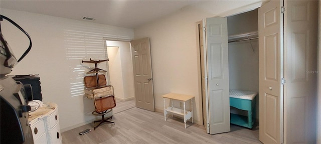 1621 Anniston Ave, Daytona Beach, FL 32117 - bedroom featuring light wood-style floors and baseboards