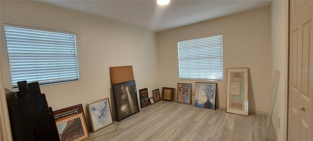 1621 Anniston Ave, Daytona Beach, FL 32117 - living room featuring light wood finished floors, healthy amount of natural light, and baseboards