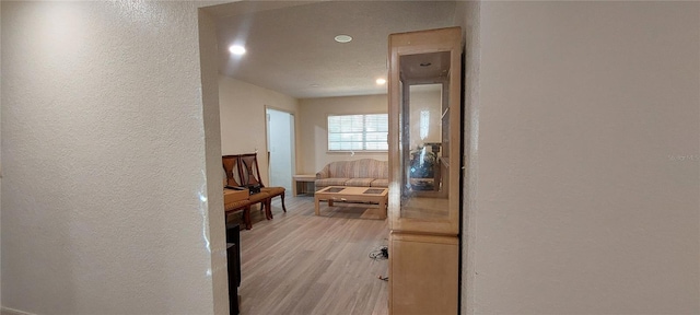 1621 Anniston Ave, Daytona Beach, FL 32117 - hall featuring a textured wall, light wood-style flooring, and recessed lighting