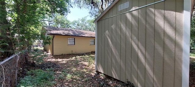 1621 Anniston Ave, Daytona Beach, FL 32117 - view of side of home featuring fence