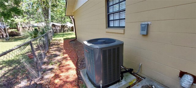 1621 Anniston Ave, Daytona Beach, FL 32117 - exterior view of central air condition unit and fence