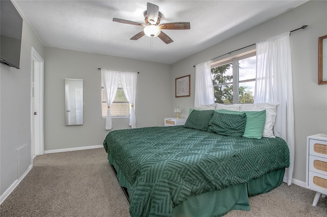 2842 English Dr, Deltona, FL 32738 - carpeted bedroom with baseboards and ceiling fan