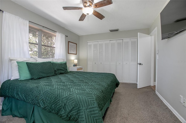 2842 English Dr, Deltona, FL 32738 - bedroom with carpet flooring, baseboards, ceiling fan, and a closet