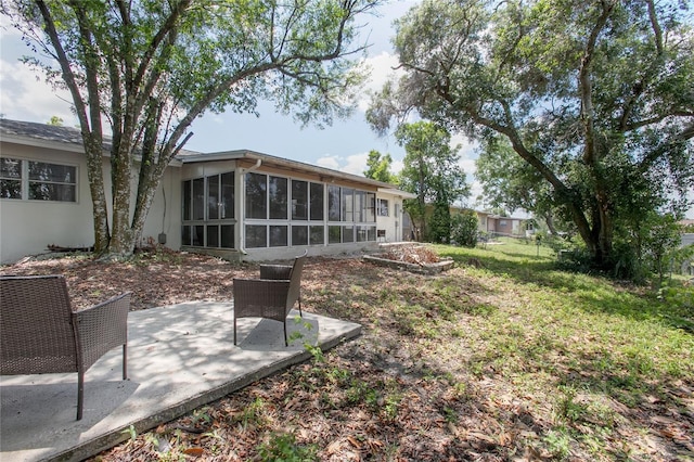 2842 English Dr, Deltona, FL 32738 - view of yard with a patio area and a sunroom