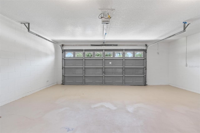 23 Forest Hill Dr, Palm Coast, FL 32137 - garage with concrete block wall and a garage door opener