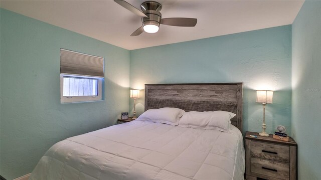 8 Ocean Dunes Dr, Ormond Beach, FL 32176 - bedroom with ceiling fan and a textured wall