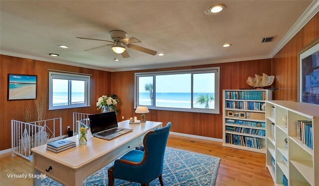8 Ocean Dunes Dr, Ormond Beach, FL 32176 - office with ceiling fan, light wood-style floors, ornamental molding, wood walls, and recessed lighting