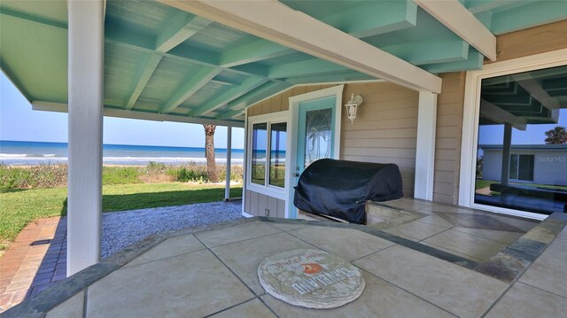 8 Ocean Dunes Dr, Ormond Beach, FL 32176 - view of patio / terrace featuring view of water and beach and grilling area