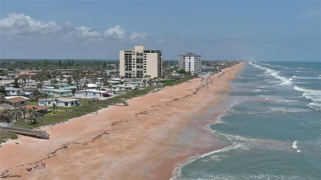 8 Ocean Dunes Dr, Ormond Beach, FL 32176 - drone / aerial view of waterfront with a beach