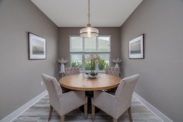 3026 Adrian Dr, Ormond Beach, FL 32174 - dining space featuring baseboards and light wood finished floors