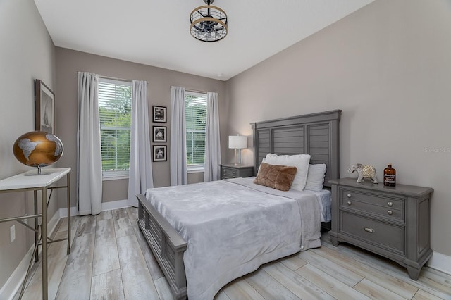 3026 Adrian Dr, Ormond Beach, FL 32174 - bedroom featuring light wood-type flooring and baseboards