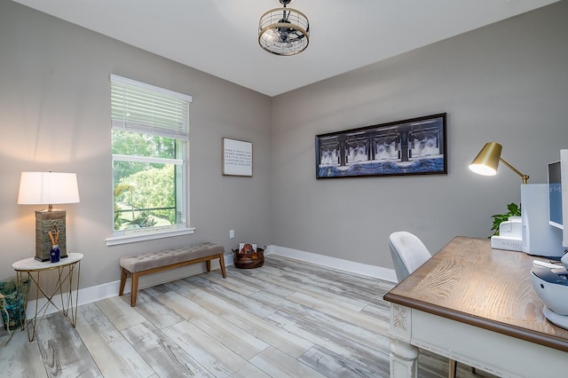 3026 Adrian Dr, Ormond Beach, FL 32174 - home office featuring light wood-type flooring and baseboards