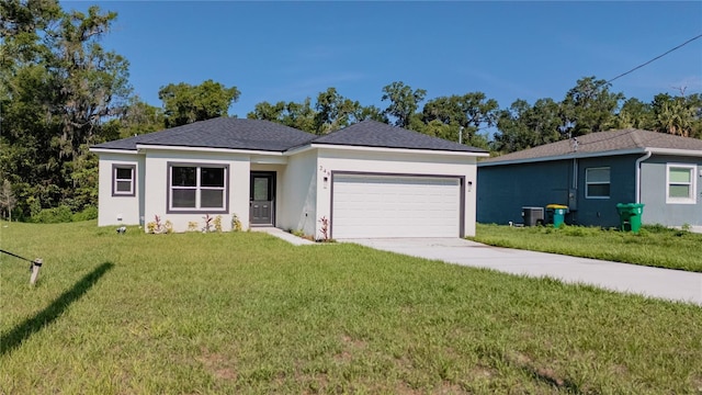 248 S Virginia Ave, Deland, FL 32724 - ranch-style home with an attached garage, concrete driveway, a front lawn, central AC unit, and stucco siding
