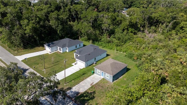 248 S Virginia Ave, Deland, FL 32724 - aerial view of property and surrounding area with a heavily wooded area