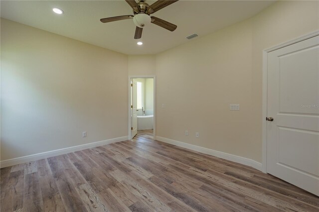 248 S Virginia Ave, Deland, FL 32724 - spare room with ceiling fan, wood finished floors, recessed lighting, and baseboards