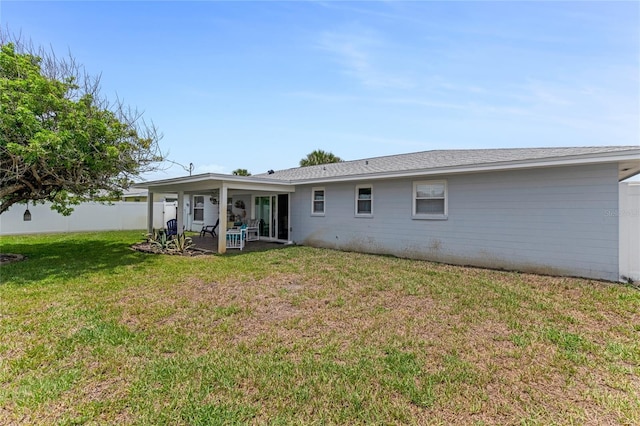 114 Ocean Aire Ter N, Ormond Beach, FL 32176 - back of property featuring a sunroom and a patio area