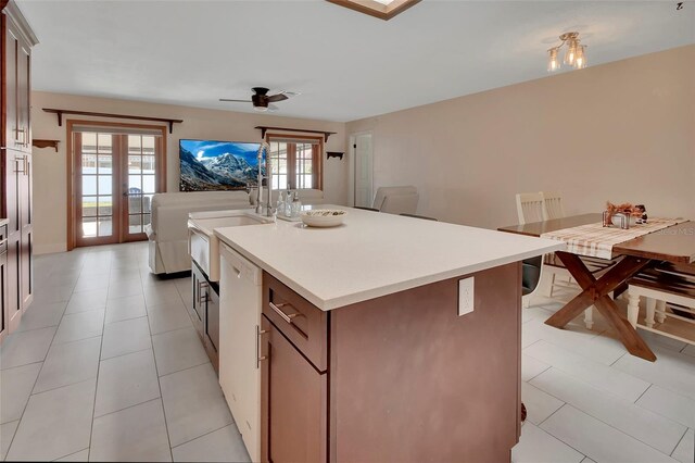 953 Tulip St, Deltona, FL 32725 - kitchen with a sink, healthy amount of natural light, a ceiling fan, and light countertops