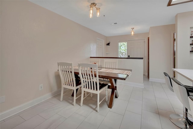 953 Tulip St, Deltona, FL 32725 - dining room with baseboards