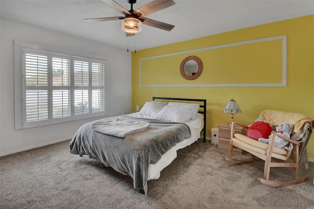 953 Tulip St, Deltona, FL 32725 - bedroom with carpet, ceiling fan, and baseboards