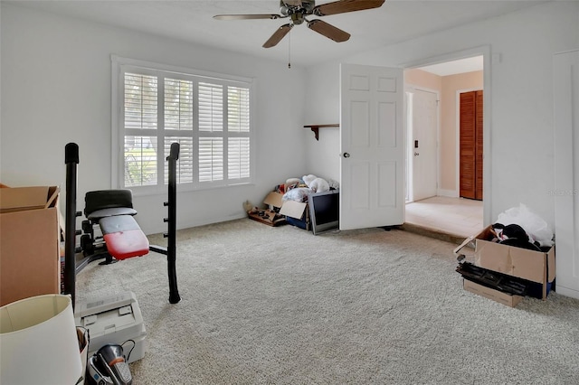 953 Tulip St, Deltona, FL 32725 - exercise room with a ceiling fan and carpet
