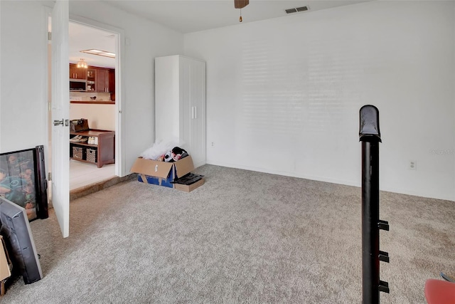 953 Tulip St, Deltona, FL 32725 - playroom featuring carpet