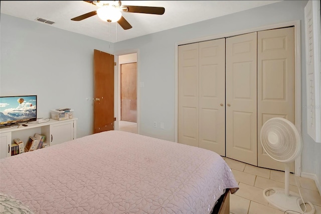 953 Tulip St, Deltona, FL 32725 - bedroom featuring light tile patterned floors, a closet, and a ceiling fan