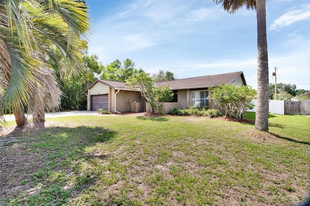 953 Tulip St, Deltona, FL 32725 - single story home with an attached garage and driveway