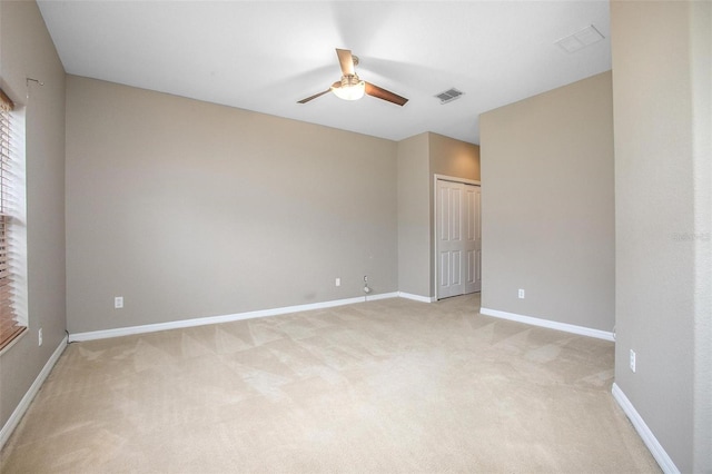 201 Dyson Dr, Deland, FL 32724 - empty room featuring ceiling fan, light carpet, and baseboards